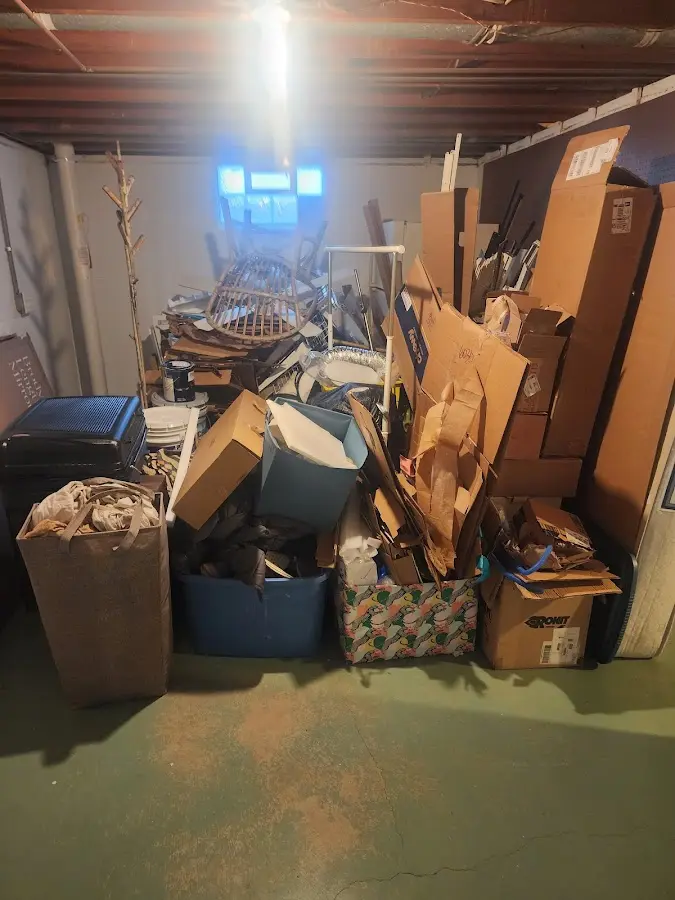 Roll-off dumpster container at job site for 6 Yard Dumpster Rental in Timberlake